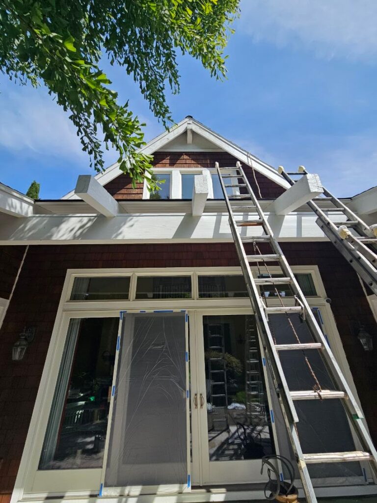 SISU Painting | Exterior Paint Touch-Ups: Why They Rarely Work | Sisu Painting Portland Home maintenance professional performing exterior paint touch-ups to improve curb appeal.